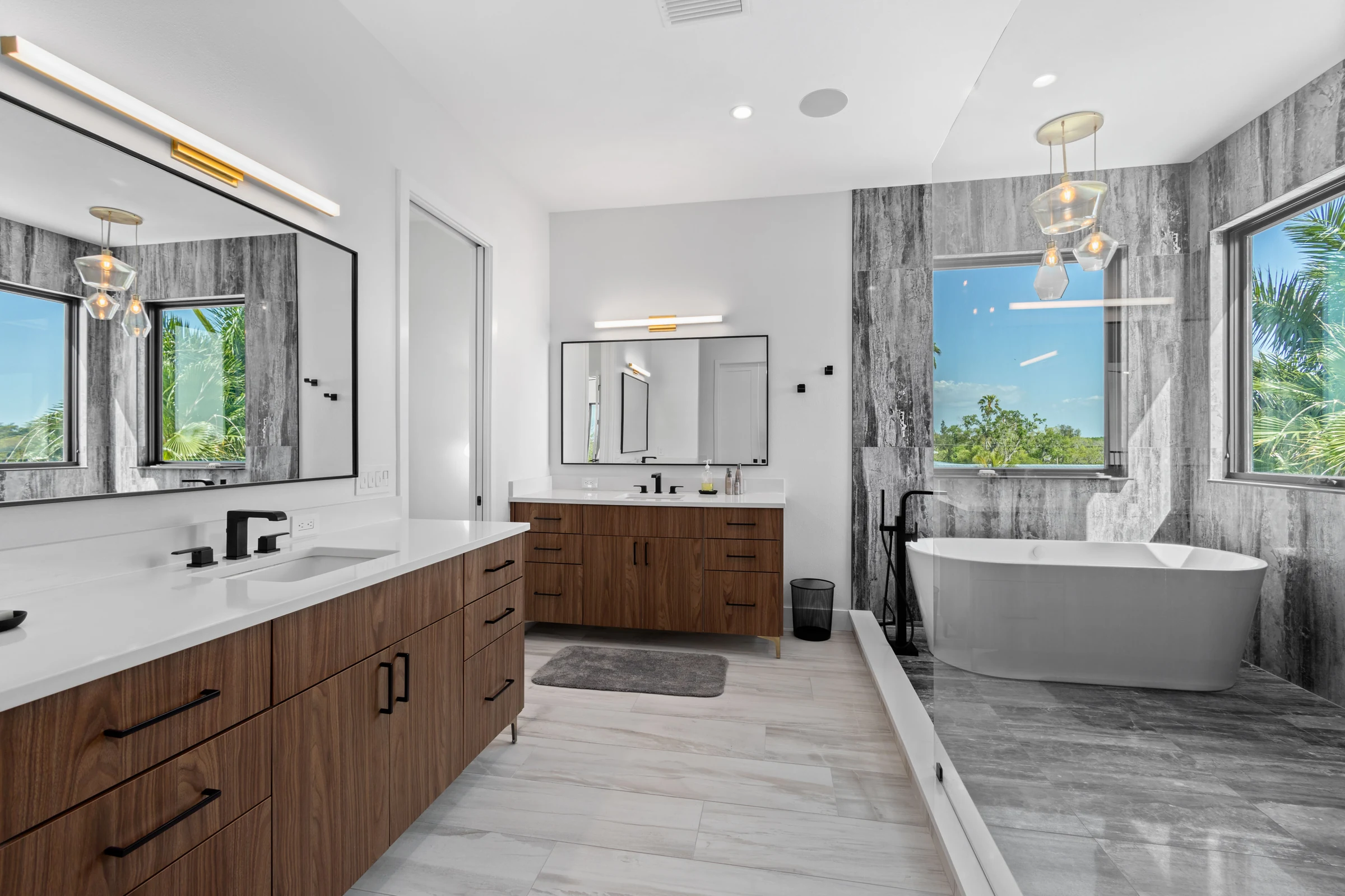 Modern bathroom with a freestanding tub photographed by Vuzario