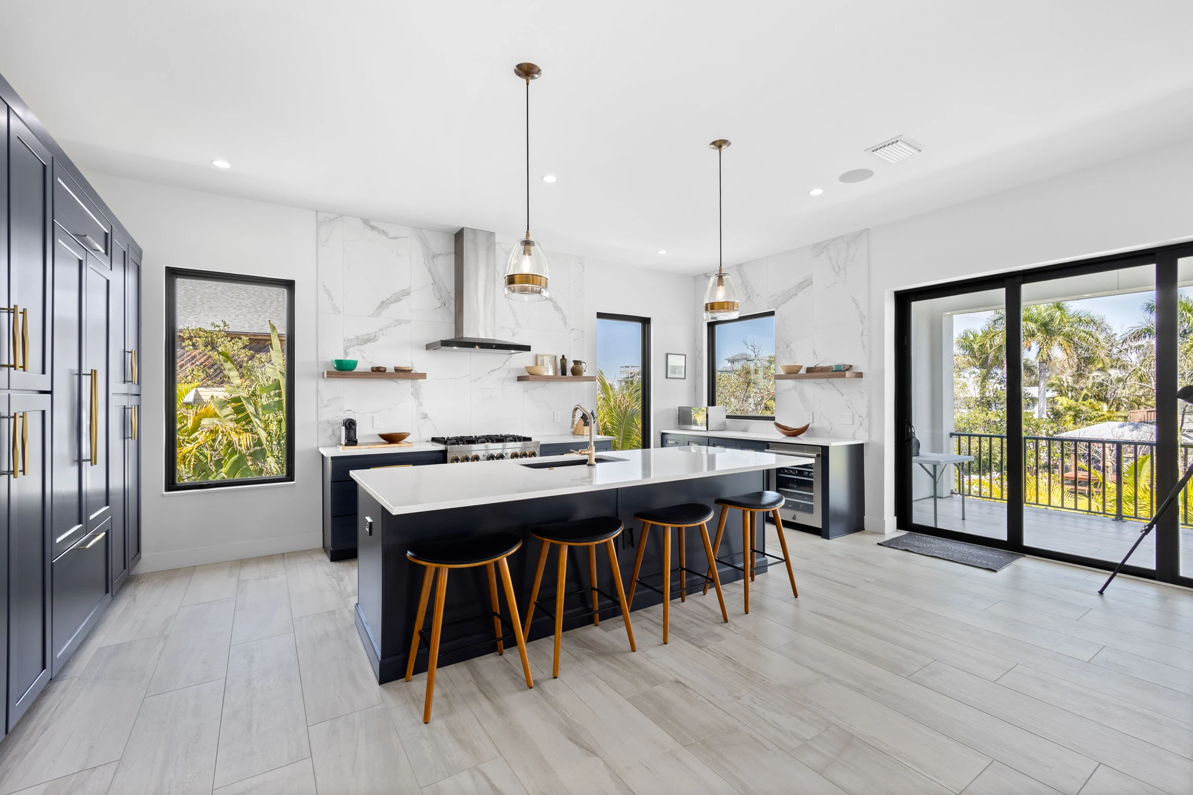 Kitchen and dining with indoor-outdoor flow photographed by Vuzario