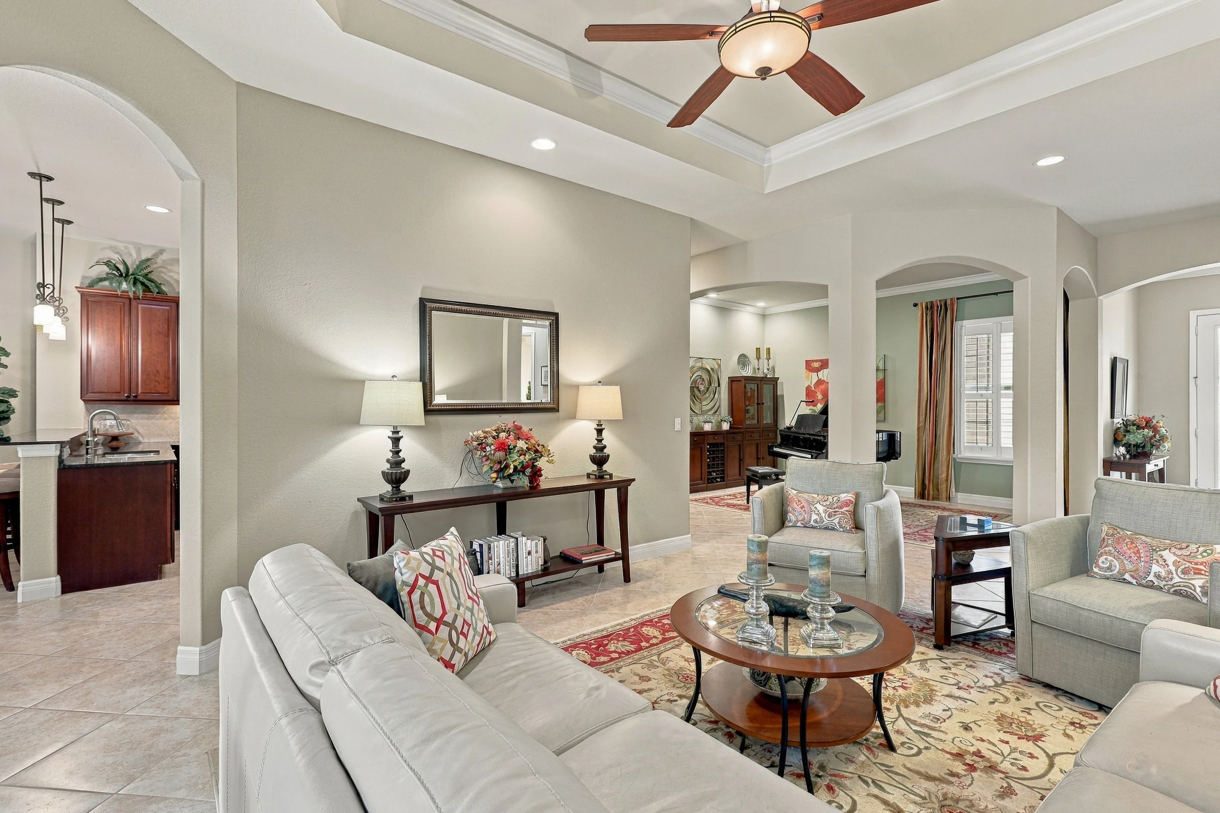 Living room with warm accents photographed by Vuzario