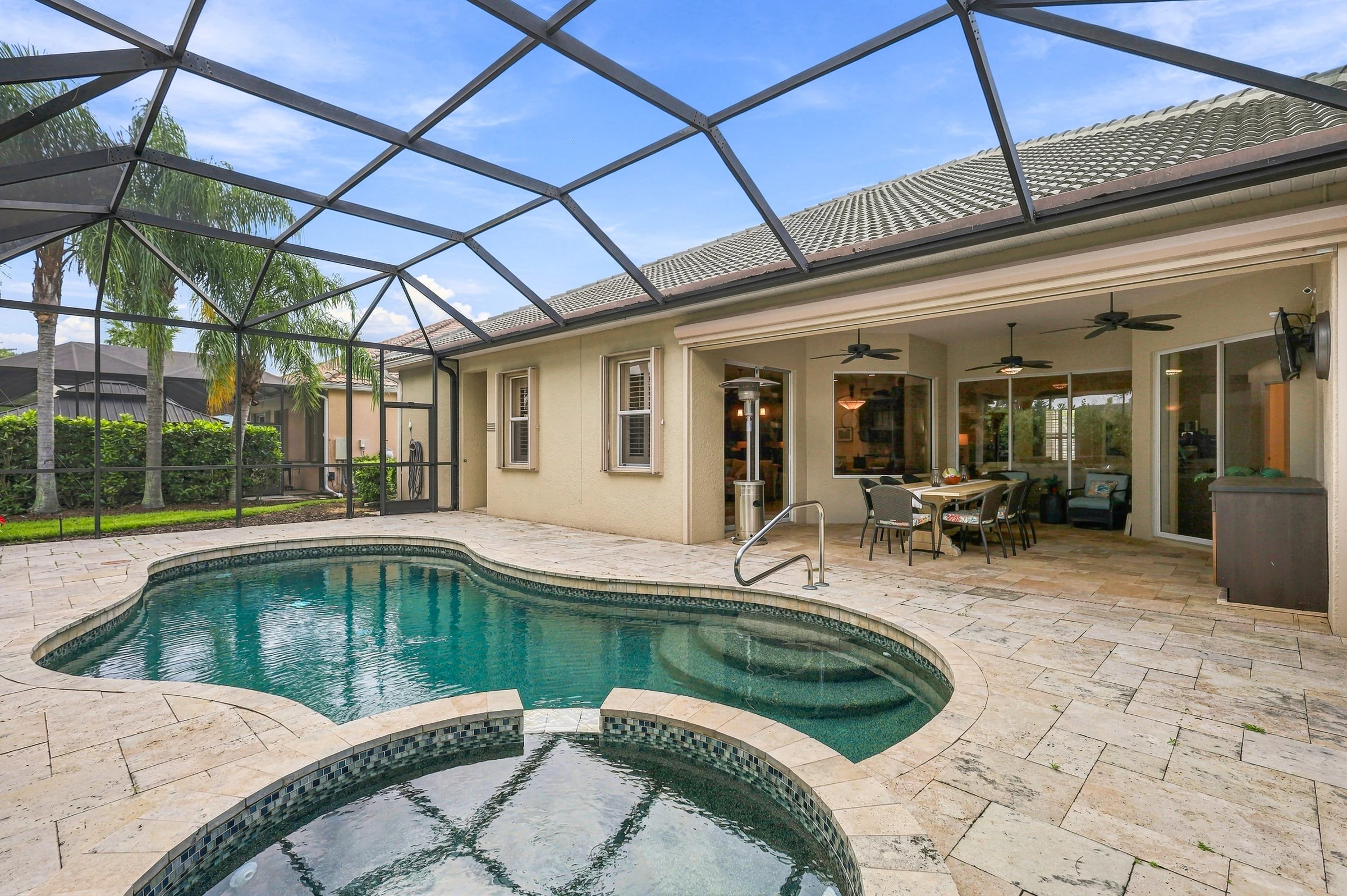 Pool and covered patio photographed by Vuzario