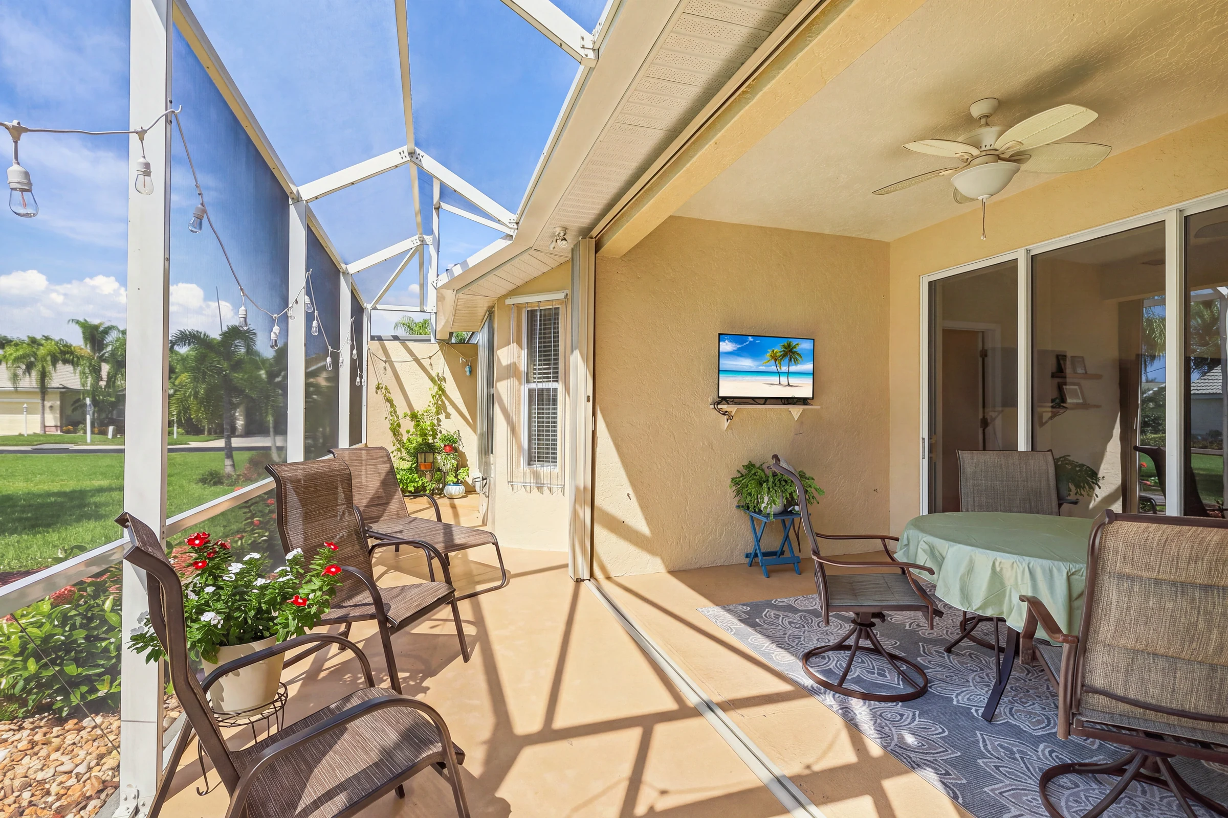 Covered patio and screened outdoor living photographed by Vuzario
