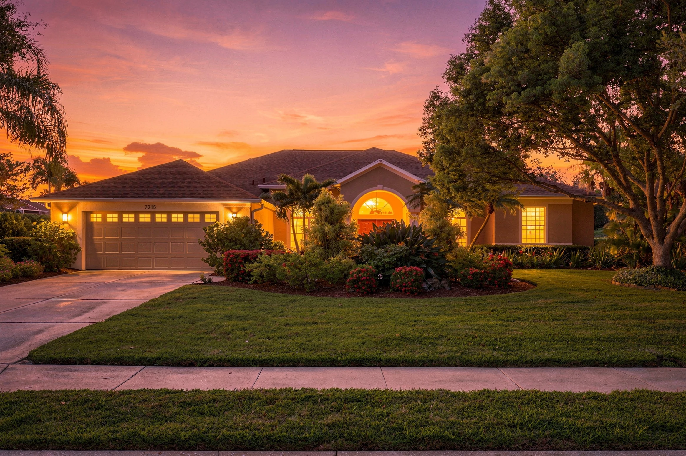 Florida home beneath a colorful evening sky photographed by Vuzario