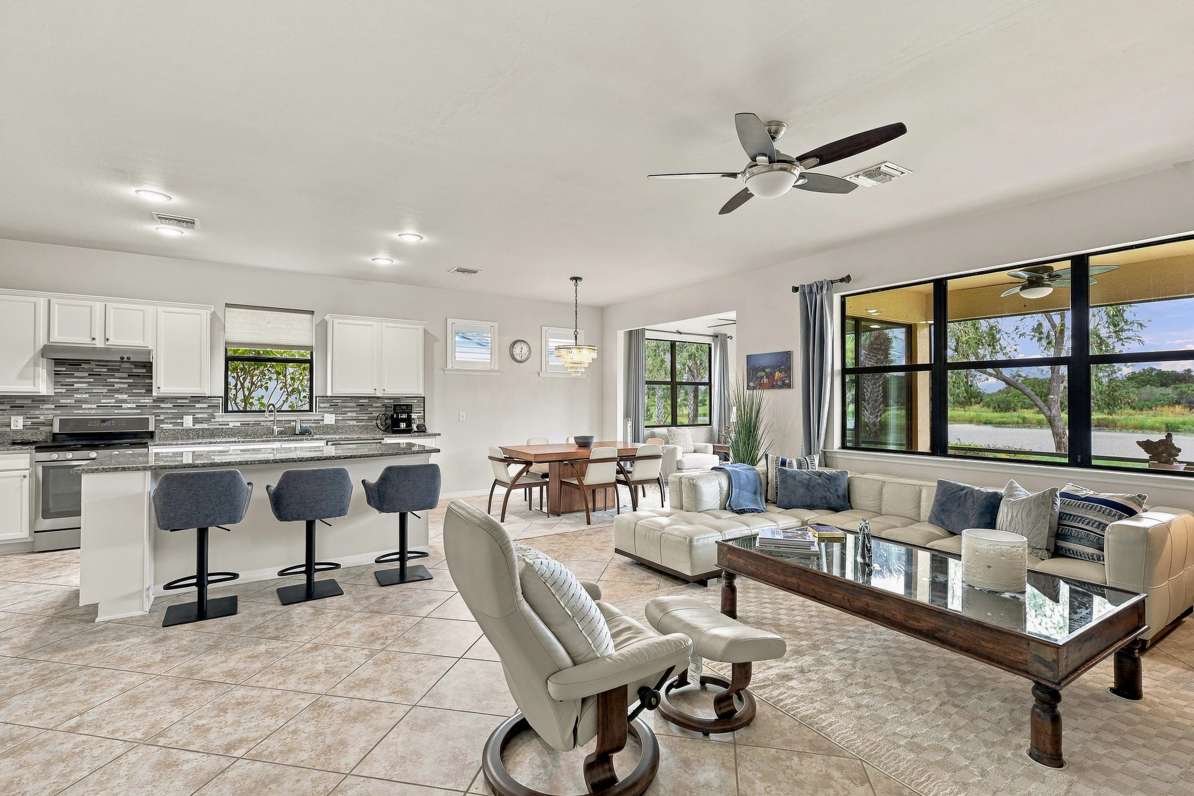 Open kitchen and living room photographed by Vuzario
